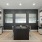 Modern coworking space featuring communal tables, cozy lounge areas, and vibrant wall art.